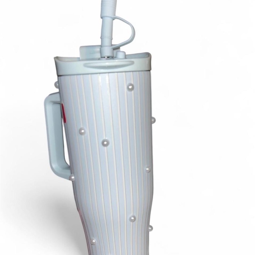 White and blue striped insulated bottle with peal detailing and Handle